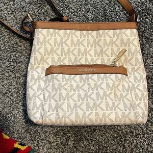 Micheal Kors medium messenger logo vanilla crossbody bag, great condition.